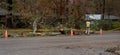 Carrboro, North Carolina, US-November 13, 2018: Workers repairing power lines after tree fell on them in storm Royalty Free Stock Photo