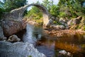 CARRBRIDGE, BADENOCH and STRATHSPEY/SCOTLAND - AUGUST 23 : Packhorse Bridge at Carrbridge Scotland on August 23, 2015 Royalty Free Stock Photo