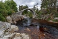 CARRBRIDGE, BADENOCH and STRATHSPEY/SCOTLAND - MAY 21 : Packhorse bridge at Carrbridge Scotland on May 21, 2011 Royalty Free Stock Photo