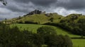 Carreg Cennen castle sits high on a hill near the River Cennen, in the village of Trap, four miles south of Llandeilo in Royalty Free Stock Photo