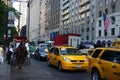 Carriage cab rickshaw and limo in new york city