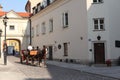 Carriage riding in the street of Old Town. Royalty Free Stock Photo