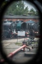 Carriage window view of the steam locomotives