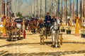 4 carriages, horses and coachmen on the Horse Feria Feria de Caballo , Jerez de la Frontera, Andalusia, Spain, May 14, 2019