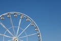 White ferris wheel against a blue sky background Royalty Free Stock Photo