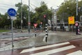 Carriageway with pedestrian crossing, road signs and traffic lights for cyclists and transport in Amsterdam