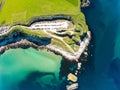 Carrick a Rede Rope Bridge in Ballintoy Northern Ireland. Aerial view on Cliffs and turquoise Atlantic Ocean water Royalty Free Stock Photo