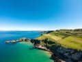 Carrick a Rede Rope Bridge in Ballintoy Northern Ireland. Aerial view on Cliffs and turquoise Atlantic Ocean water Royalty Free Stock Photo