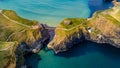 Carrick-A-Rede Rope Bridge at Ballycastle North Ireland - aerial view Royalty Free Stock Photo