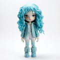 Carrie Vinyl Toy With Blue Curly Hair And White Jacket