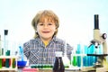 They carried out a new experiment in chemistry. Science and education concept. Science. Happy little scientist making Royalty Free Stock Photo