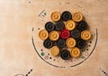 Carrom men pieces arranged on a board