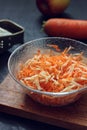 carrot and apple salad in a glass bowl. Royalty Free Stock Photo