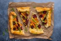 Carrot and Beet Tart with pesto and phyllo dough. Savoury vegetable baking. Homemade vegetarian food.Top view