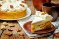 Carrot cake cheesecake with pecan on a wood background Royalty Free Stock Photo