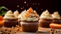 Carrot cake cupcake, with cream cheese frosting, with sprinkle of grated carrots