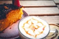 Carrot cake and a latte caramel coffee Royalty Free Stock Photo