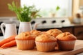 Carrot cake muffins with cream cheese frosting on blurred background, perfect dessert concept