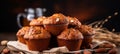 Carrot cake muffins with cream cheese frosting, delicious homemade dessert concept on wooden table