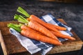 Carrot. Fresh Carrots bunch. Baby carrots. Raw fresh organic orange carrots. Healthy vegan vegetable food Royalty Free Stock Photo