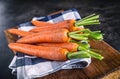 Carrot. Fresh Carrots bunch. Baby carrots. Raw fresh organic orange carrots. Healthy vegan vegetable food Royalty Free Stock Photo