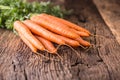 Carrot. Fresh carrots on rustic oak table