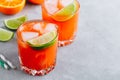 Carrot Ginger Margarita cocktail with lime in glass