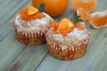 Carrot Healthy Muffins Cupcakes Buns on a WoodenRustic board. Homemade Food.