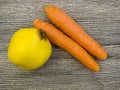 Carrot and kiwi pictures, carrot kiwi and quince pictures in a fruit basket, winter season fruits, Royalty Free Stock Photo