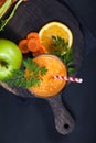 Carrot orange smoothie. Healthy lifestile. Green concept.