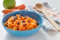 Carrot salad with raisins and apple