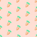 Carrot seamless pattern on apricot colour background.