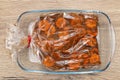 Carrot slices baked in a sleeve for baking in the oven.