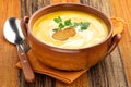 Carrot soup with croutons and parsley