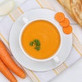 Carrot soup with fresh carrots in bowl from above healthy eating Royalty Free Stock Photo