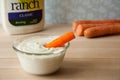 Carrot stick in ranch dressing