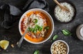Carrot sweet potato soup with rice on the dark table, top view. Royalty Free Stock Photo