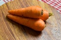Carrots on a Brown Wooden Background Royalty Free Stock Photo