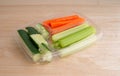Carrots celery and cucumbers in a plastic tray