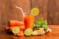 Carrots, Delicious sweet drink fresh carrot juice with lemon, ginger water Royalty Free Stock Photo