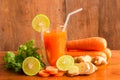 Carrots, Delicious sweet drink fresh carrot juice with lemon, ginger water Royalty Free Stock Photo