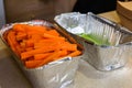 Carrots at folley bowl on table. Royalty Free Stock Photo