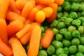 Carrots and green peas Royalty Free Stock Photo