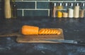 Carrots on the kitchen table before cooking. Homemade healthy food, vegetarian and homemade recipes Royalty Free Stock Photo