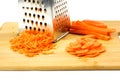 Carrots sliced and grated. Close up. Isolated on white background Royalty Free Stock Photo