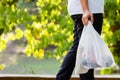 Carry Plastic Bags in the Park Royalty Free Stock Photo