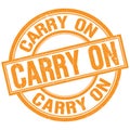 CARRY ON written word on orange stamp sign