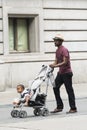 Carrying a child in a baby chair
