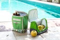 Carrying portable bags refrigerators for food and drinks. Poolside picnic