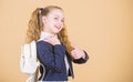 Carrying things in backpack. Learn how fit backpack correctly. Girl little fashionable cutie carry backpack. Popular Royalty Free Stock Photo